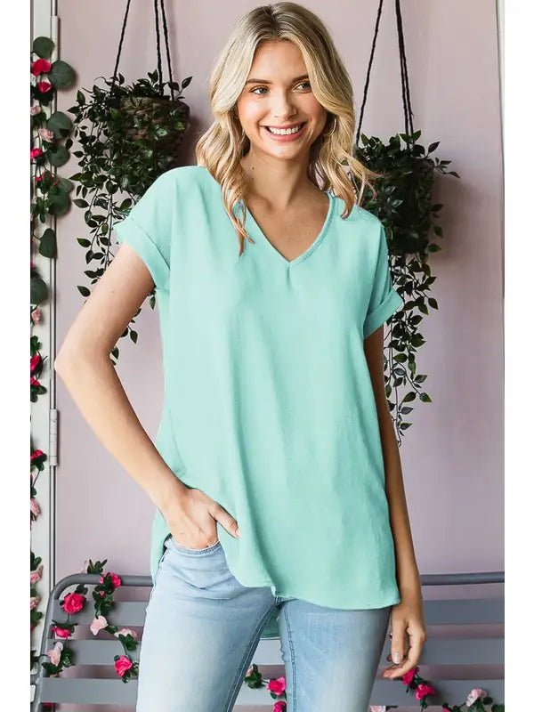 SOLID WOVEN TOP WITH DOLPHIN HEMLT-BLUE