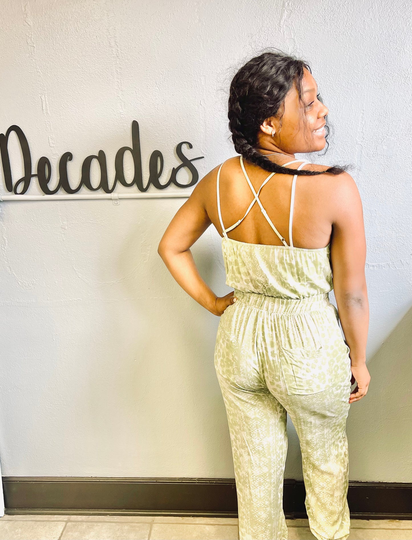 MAIN STRIP- V-Neck Tie Back Open Elastic Floral Print Jumpsuit