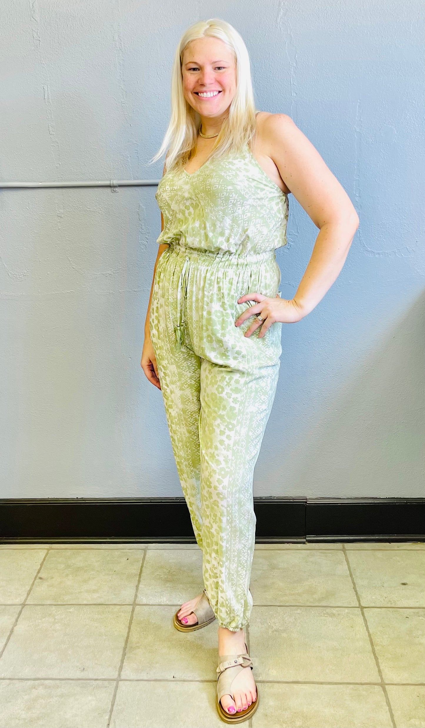 MAIN STRIP- V-Neck Tie Back Open Elastic Floral Print Jumpsuit